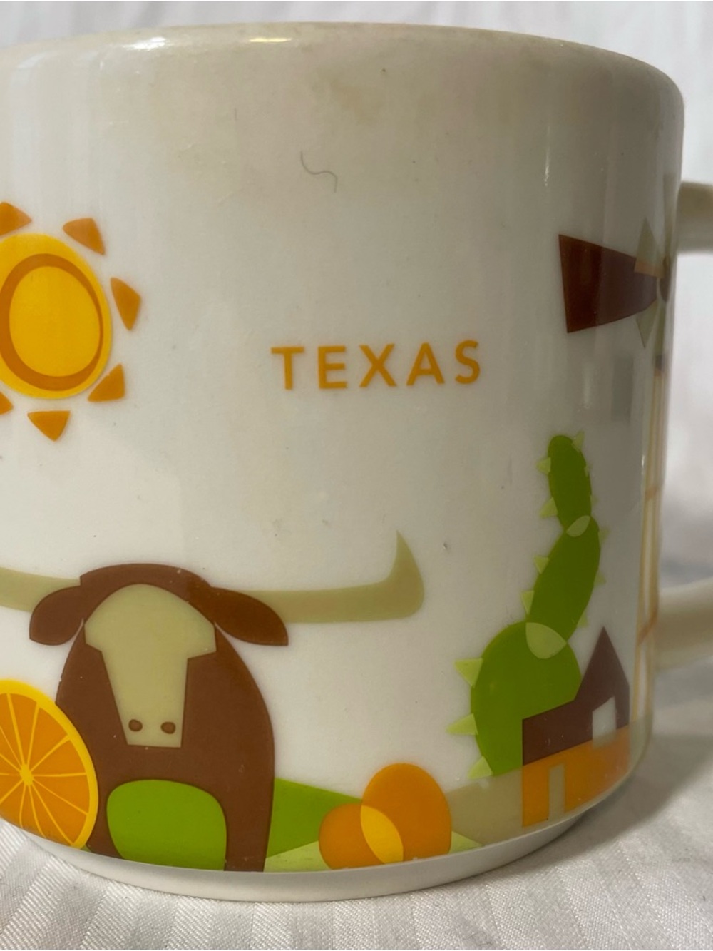 Starbucks Texas Mug in White with Yellow, Orange, Brown and Green Graphics